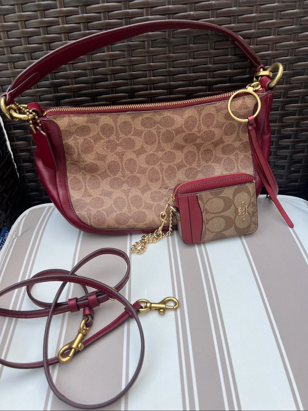 Coach Brown Signature Canvas Shoulder Bag with Red Leather Trim
